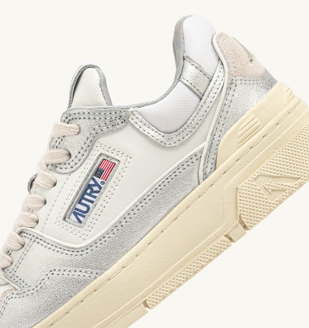 AUTRY CLC LOW SNEAKERS IN SILVER-TONE LEATHER