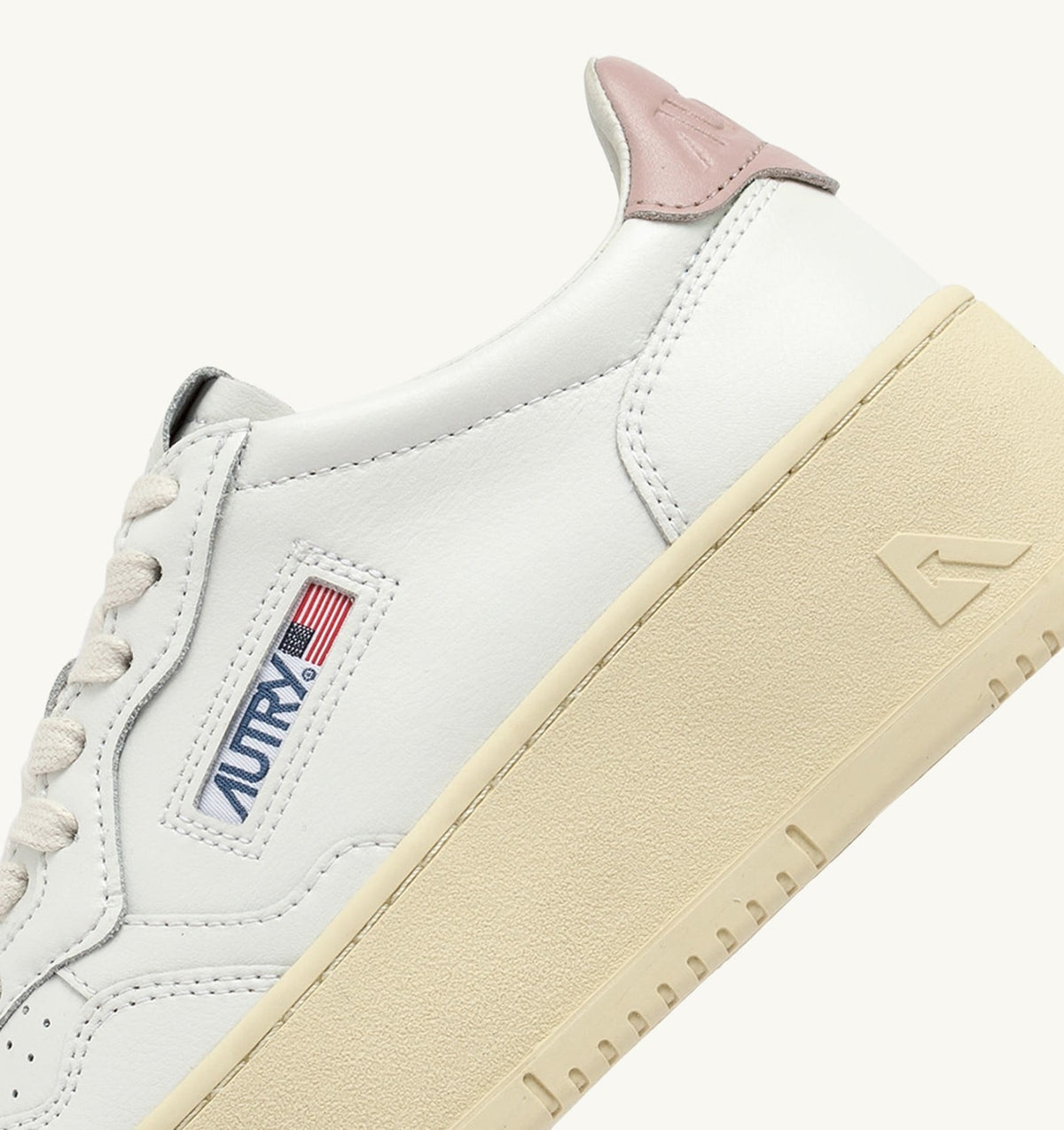 AUTRY MEDALIST PLATFORM SNEAKERS IN WHITE AND POWDER PINK LEATHER