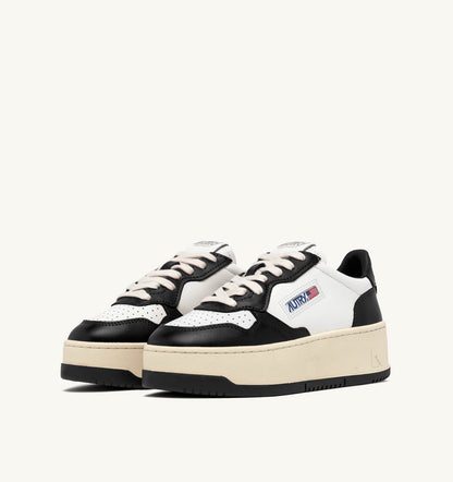AUTRY MEDALIST PLATFORM SNEAKERS IN WHITE AND BLACK LEATHER