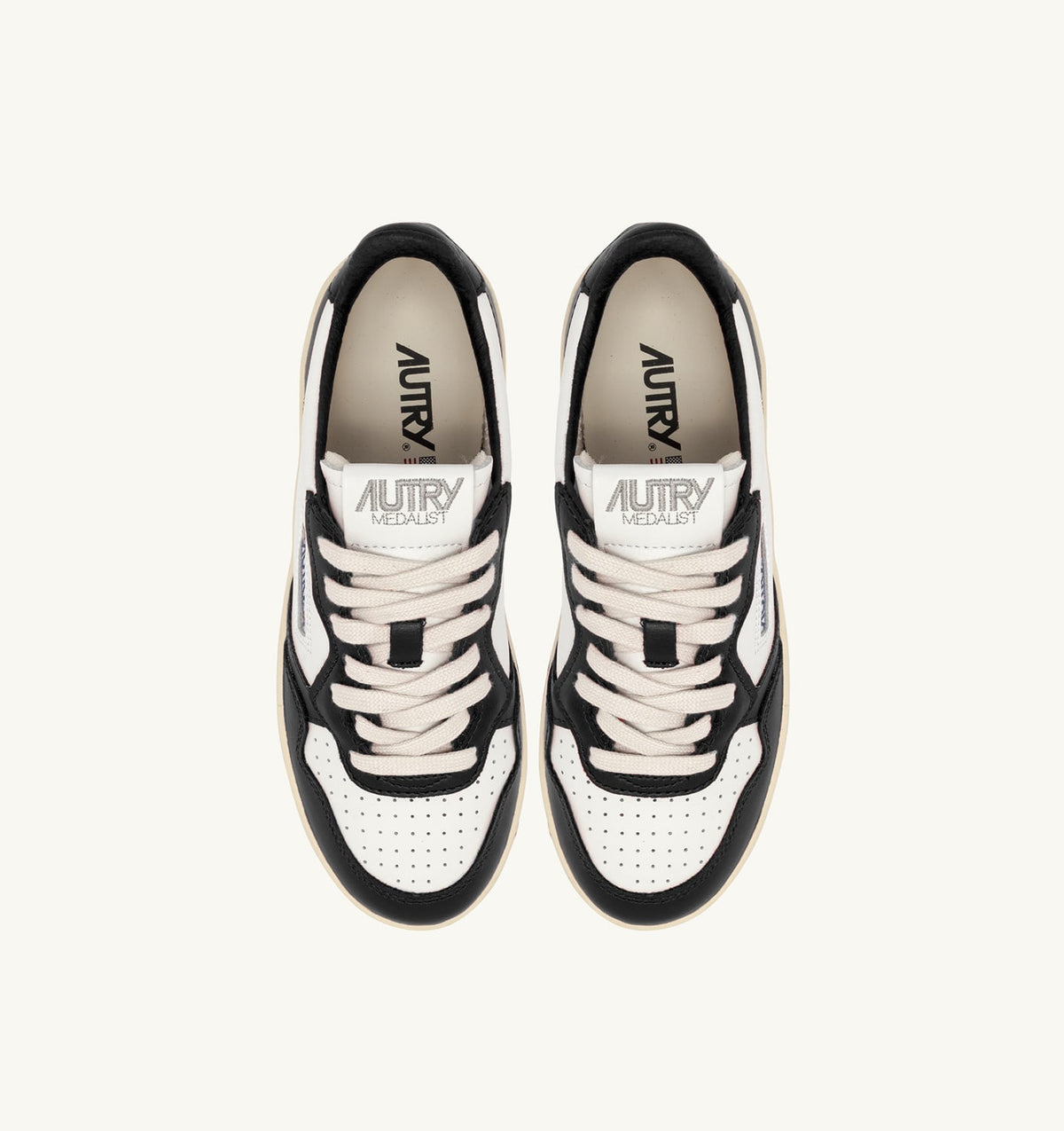 AUTRY MEDALIST PLATFORM SNEAKERS IN WHITE AND BLACK LEATHER
