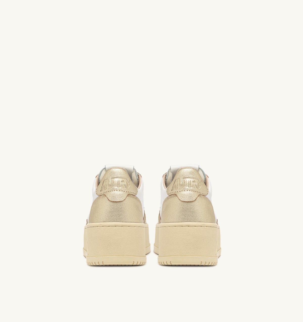 AUTRY MEDALIST PLATFORM SNEAKERS IN WHITE AND METALIZED PLATINUM LEATHER