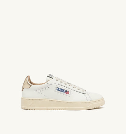 AUTRY DALLAS LOW SNEAKERS IN WHITE AND GOLD LEATHER